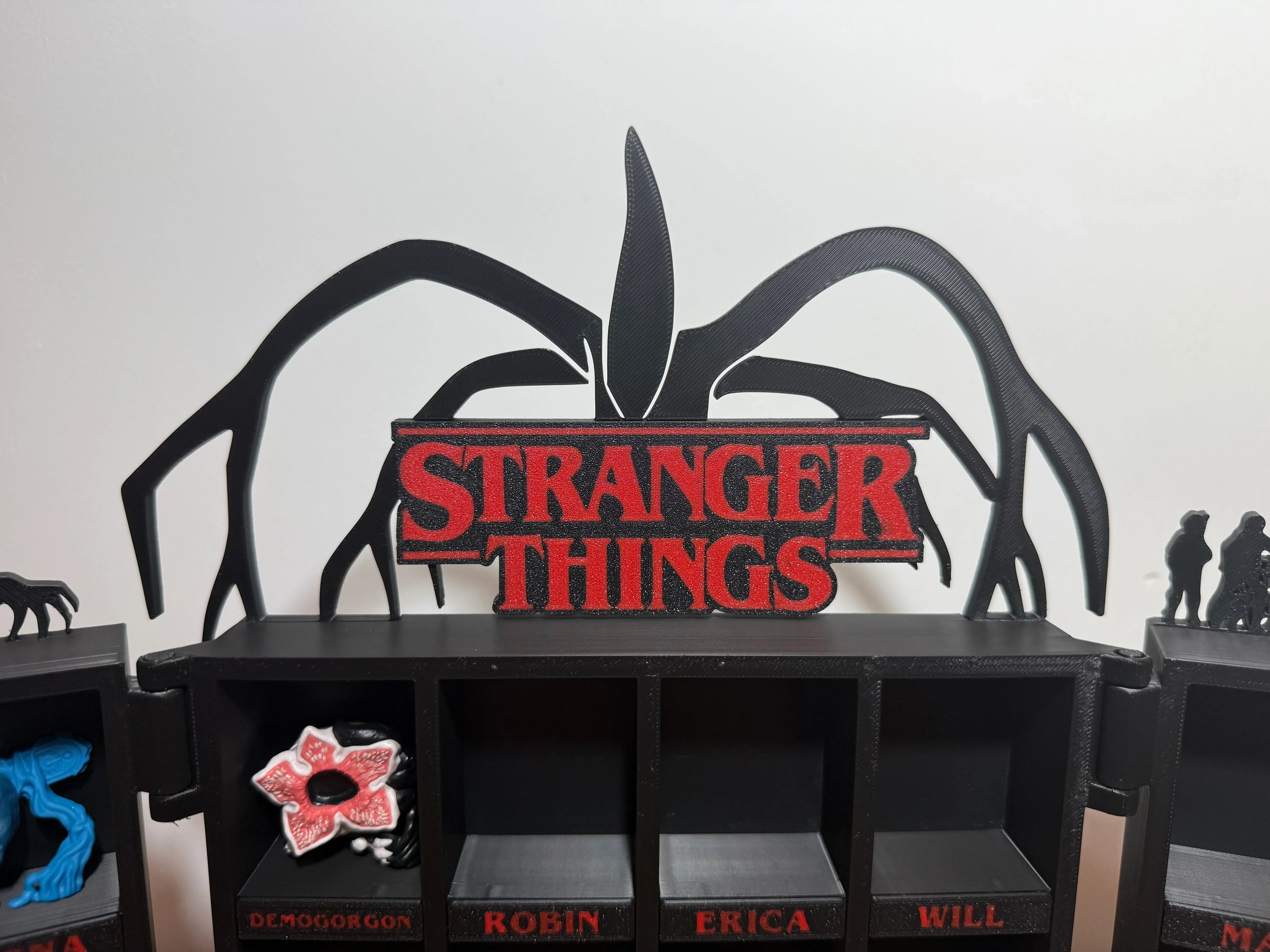 3D printed Stranger Things organizer with red logo, Demogorgon figure, modern black design