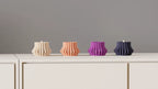 LED candle stand with ribbed surface detail
