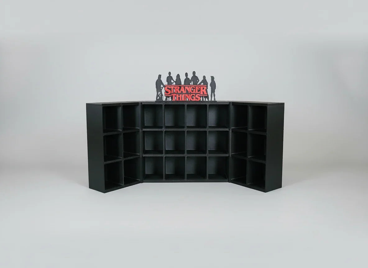 Black display case with 'Stranger Things' logo and figures on a white background