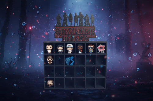 Collection of 'Stranger Things' themed figurines against a dark, forest-like background with glowing elements.