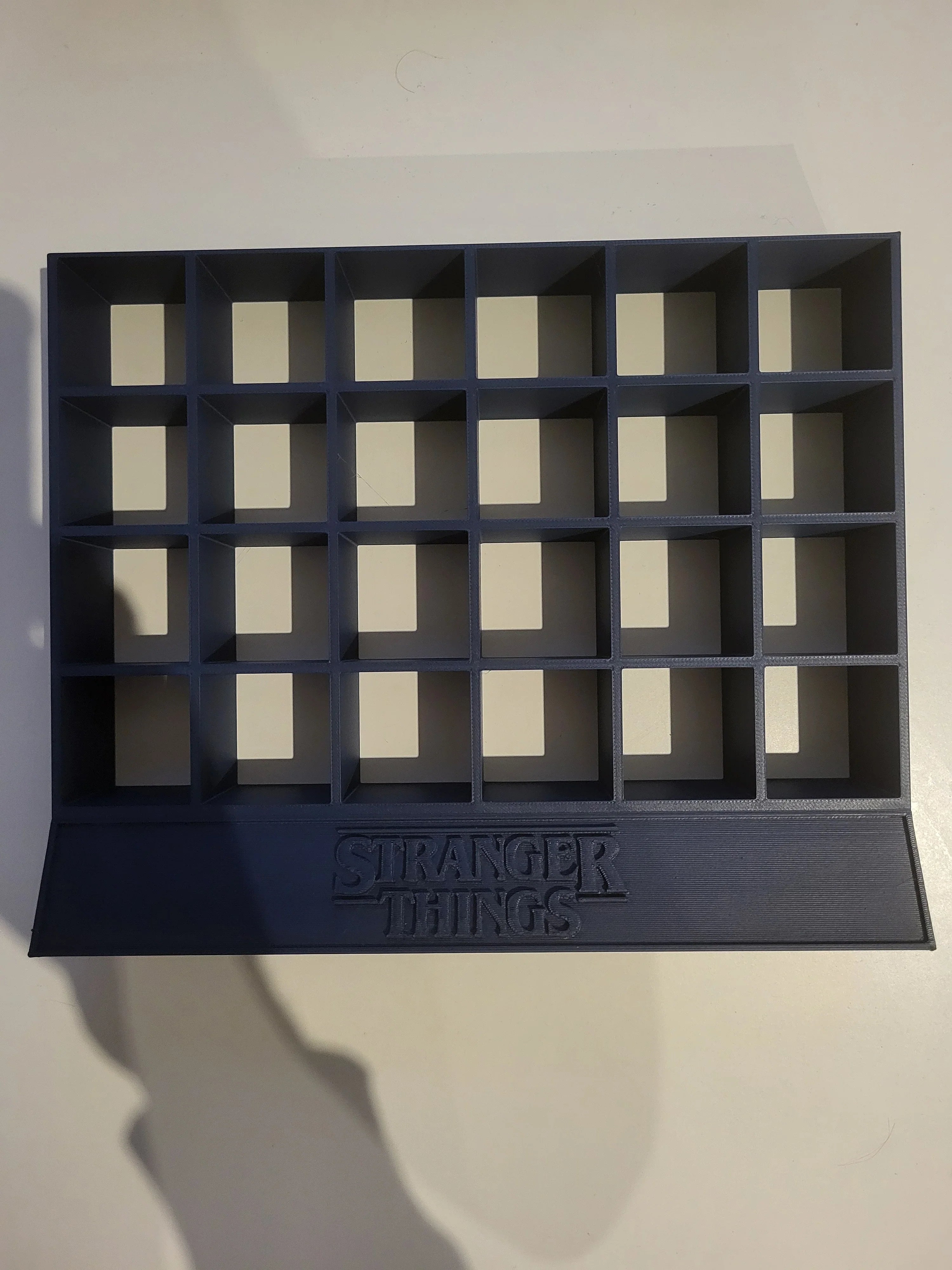 3D printed Stranger Things display organizer with multiple square compartments, Lunqo design