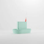 Modern desktop organiser holding pens and small desk accessories
