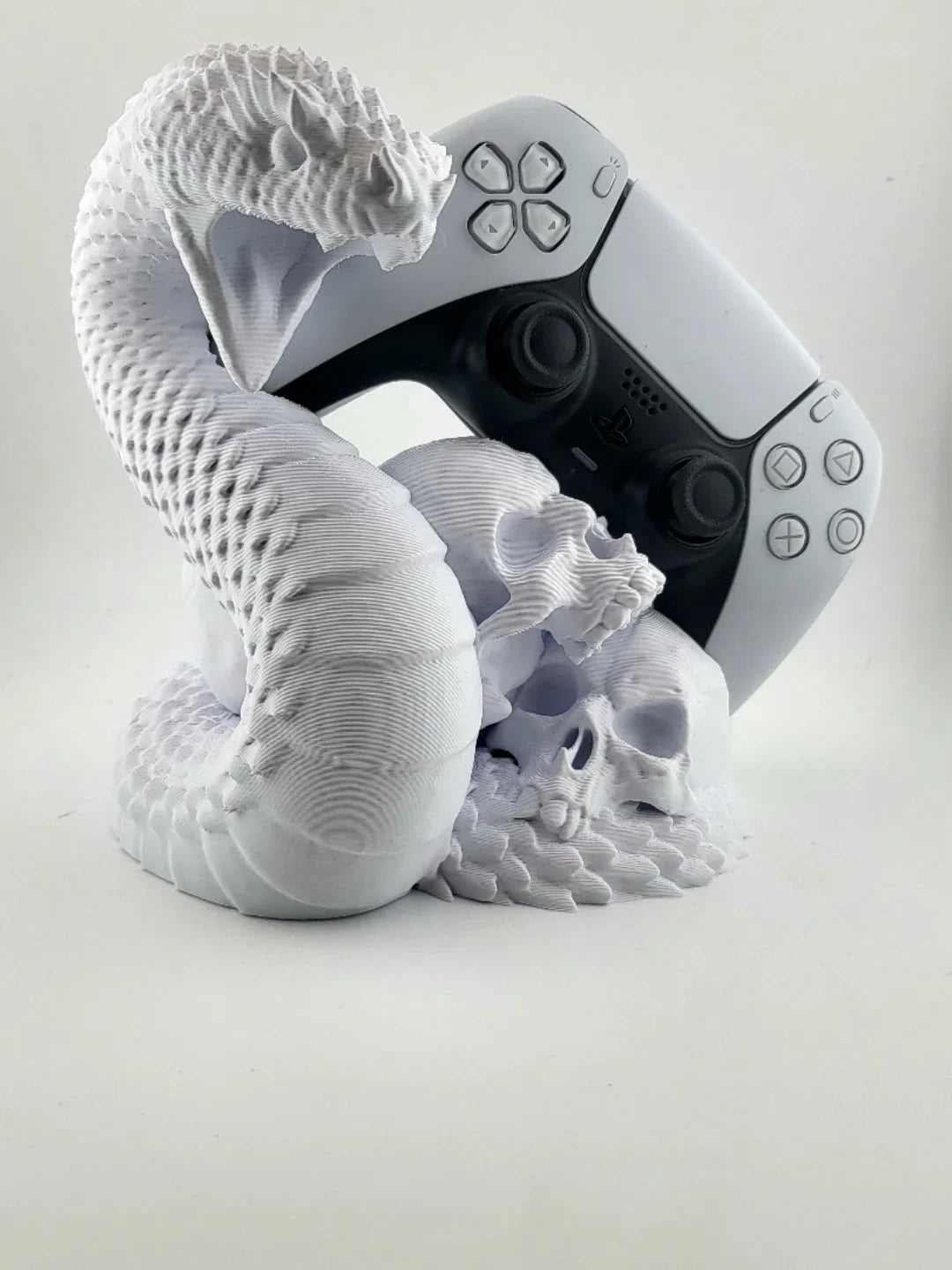 3D printed white snake and skulls PlayStation controller holder by Lunqo