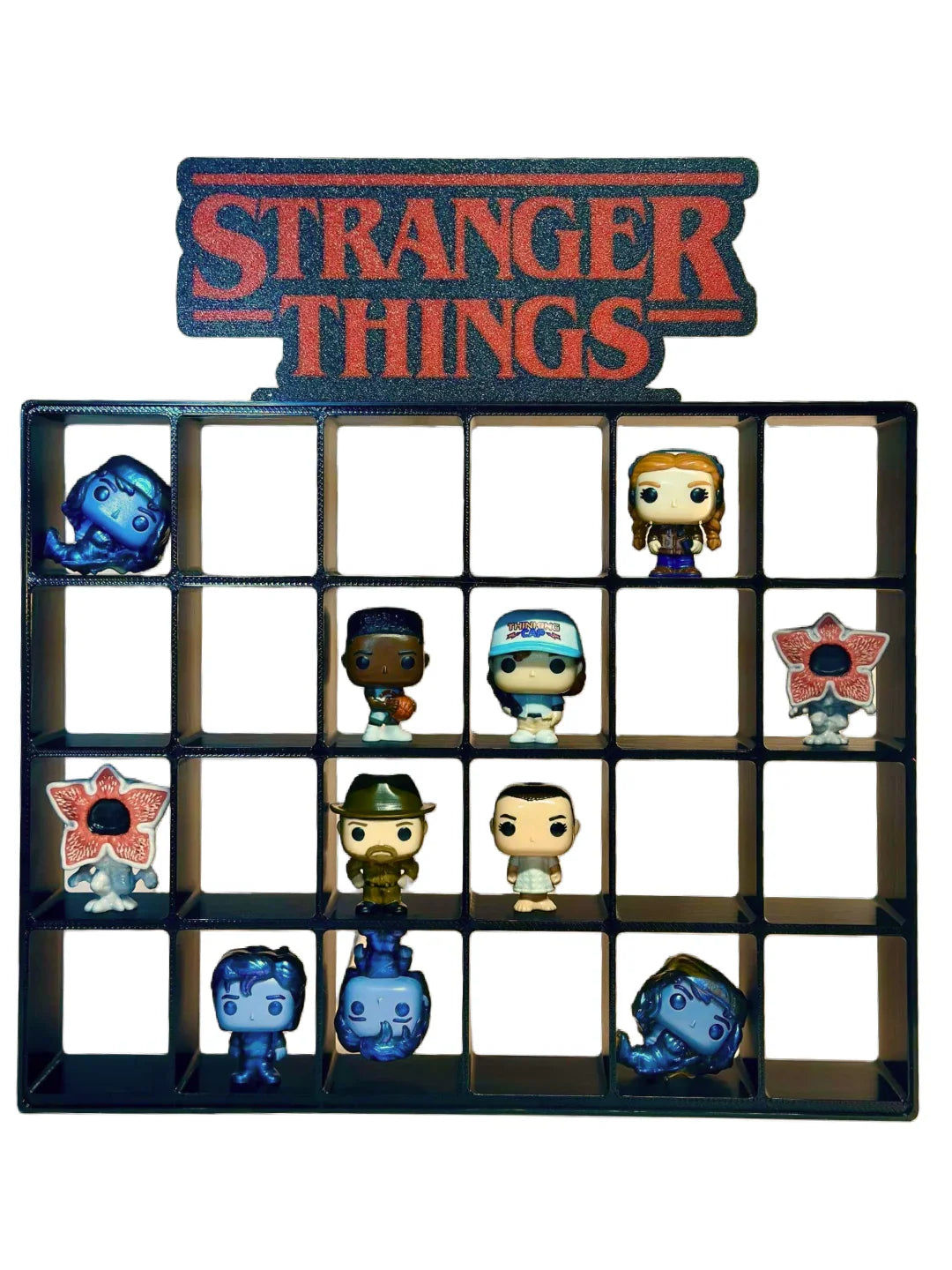Stranger Things action figure display with multiple figures on a grid stand.