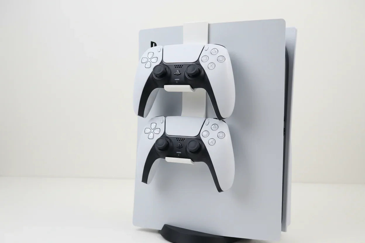 3D printed controller holder by Lunqo mounted on PlayStation 5 with two DualSense controllers