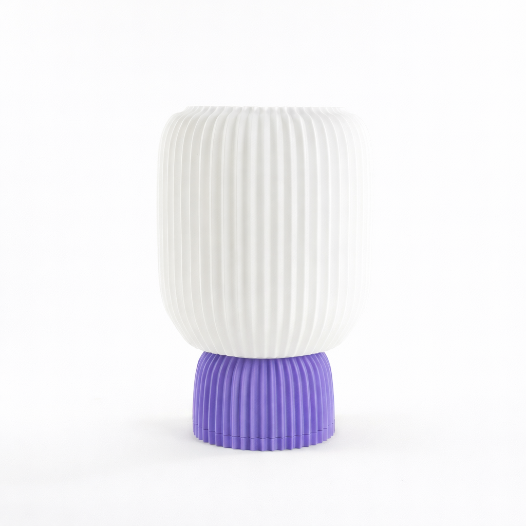 Modern white 3D printed vase with textured vertical lines and a purple base, Lunqo design
