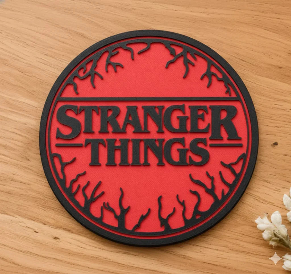Red and black 3D printed Stranger Things round coaster on wooden surface, Lunqo design
