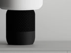 Modern 3D printed black cylindrical object with mesh texture by Lunqo on neutral background