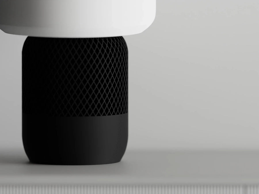 Modern 3D printed black cylindrical object with mesh texture by Lunqo on neutral background