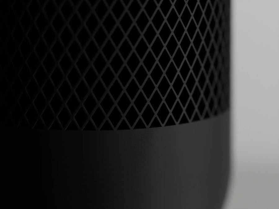 Close-up of modern black 3D printed object with diamond grid pattern, Lunqo design