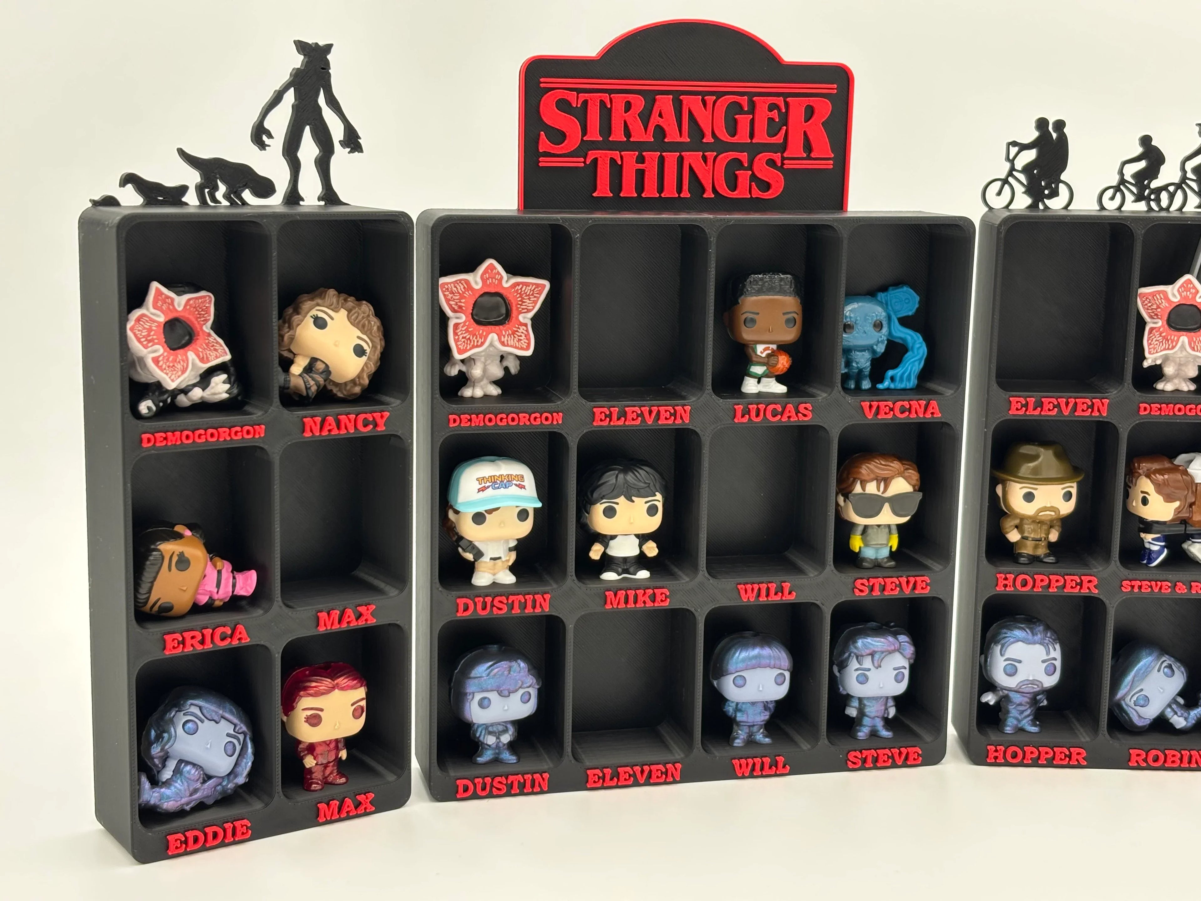 3D printed Stranger Things display shelf by Lunqo holding collectible character figures