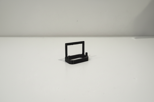 Black 3D printed accessory from Lunqo on a white background, modern minimalist design
