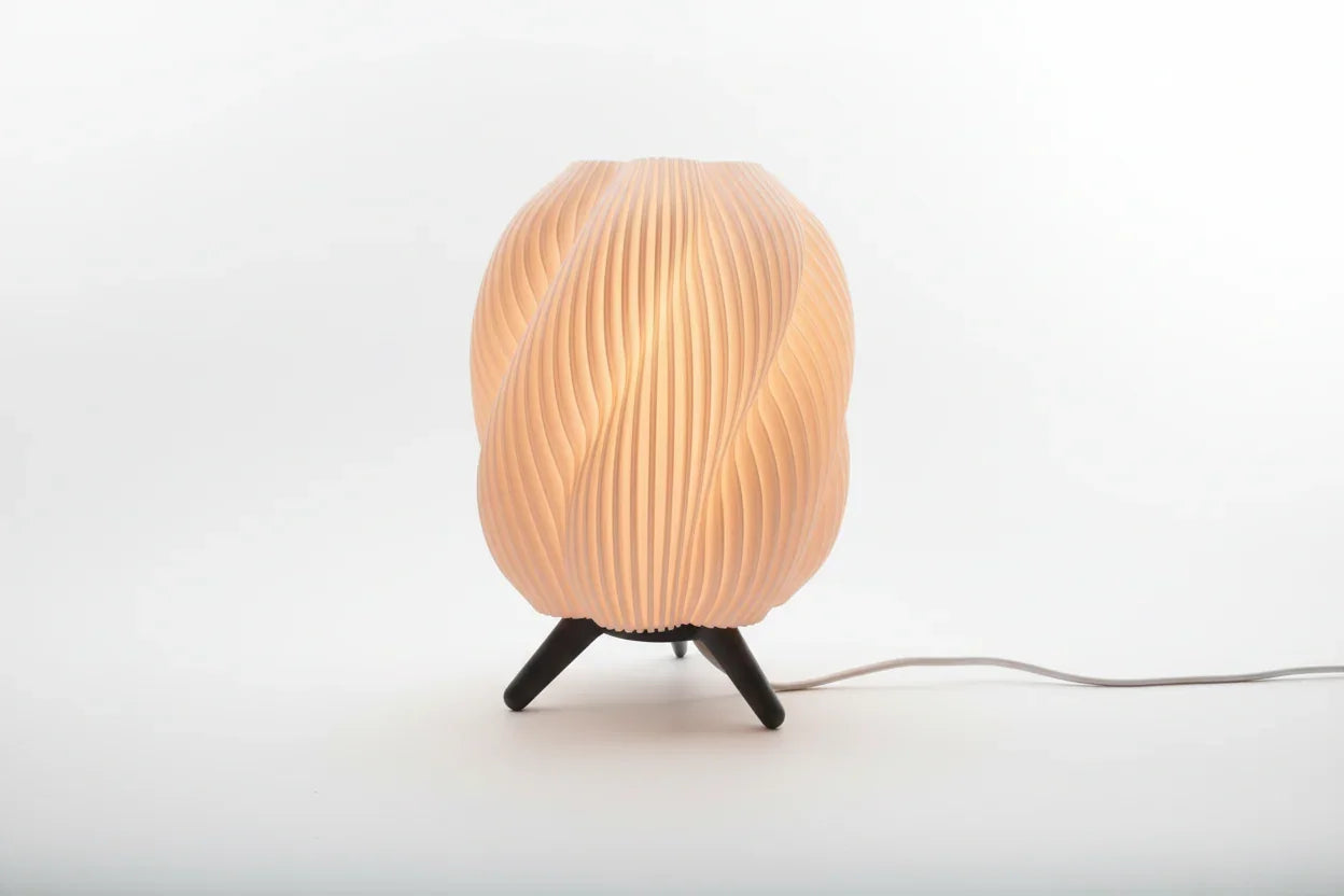 Lunqo 3D printed sculptural table lamp with modern wavy design on tripod base