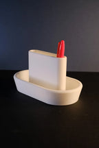 Ribbed desktop organiser with integrated dish for small essentials