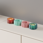 BloomGlow LED tealight holders arranged as compact shelf decor