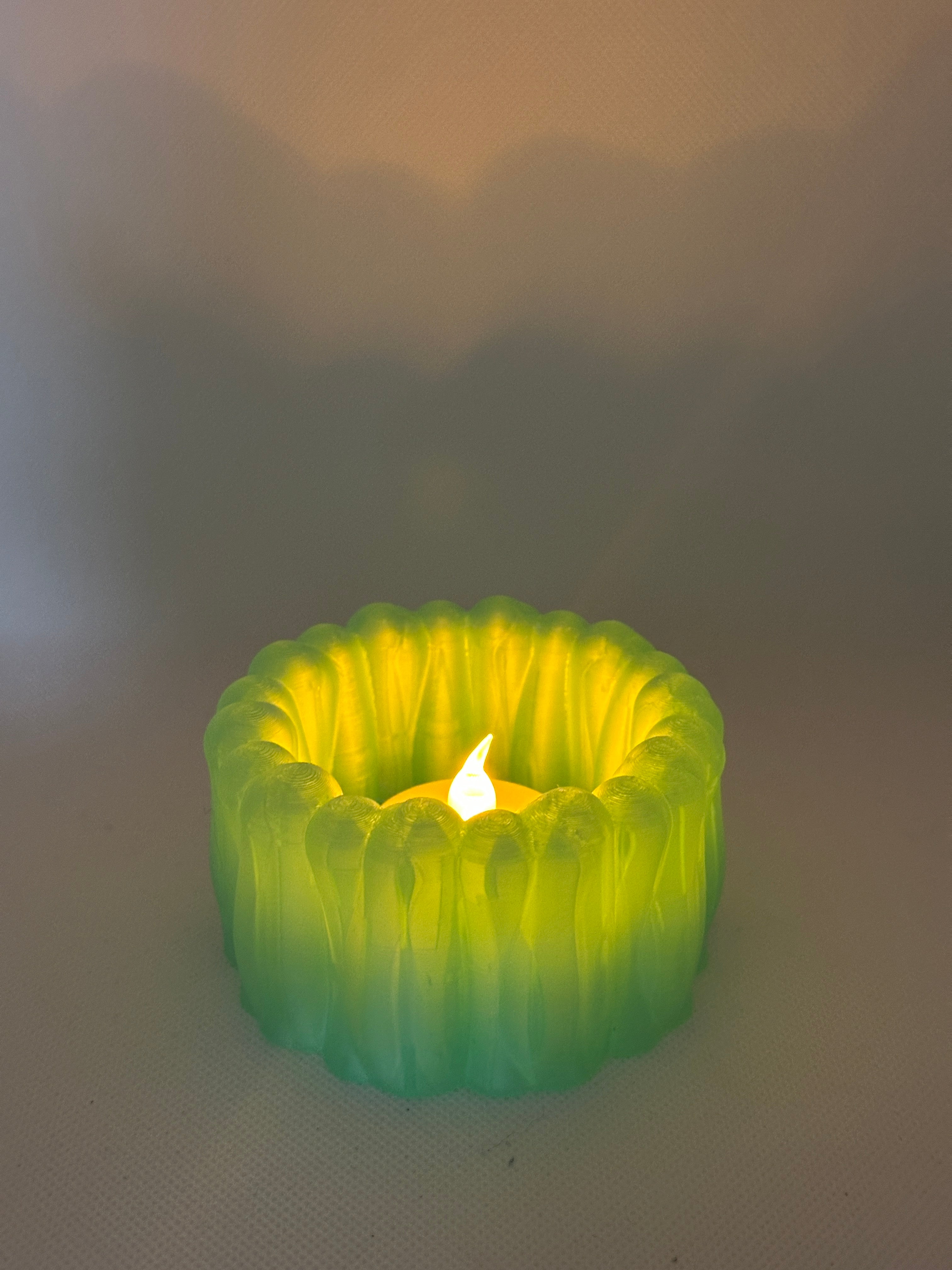 BloomGlow tealight holder casting a soft ambient glow with an LED light