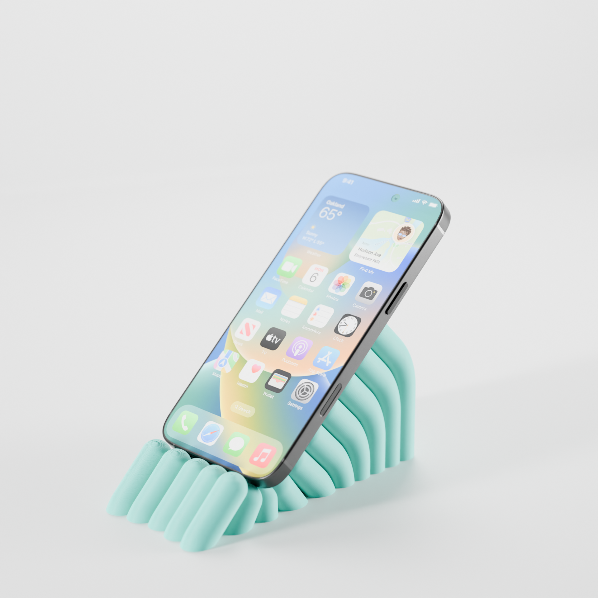 Bobble phone bed shown as a decorative desk accessory for a mobile phone.