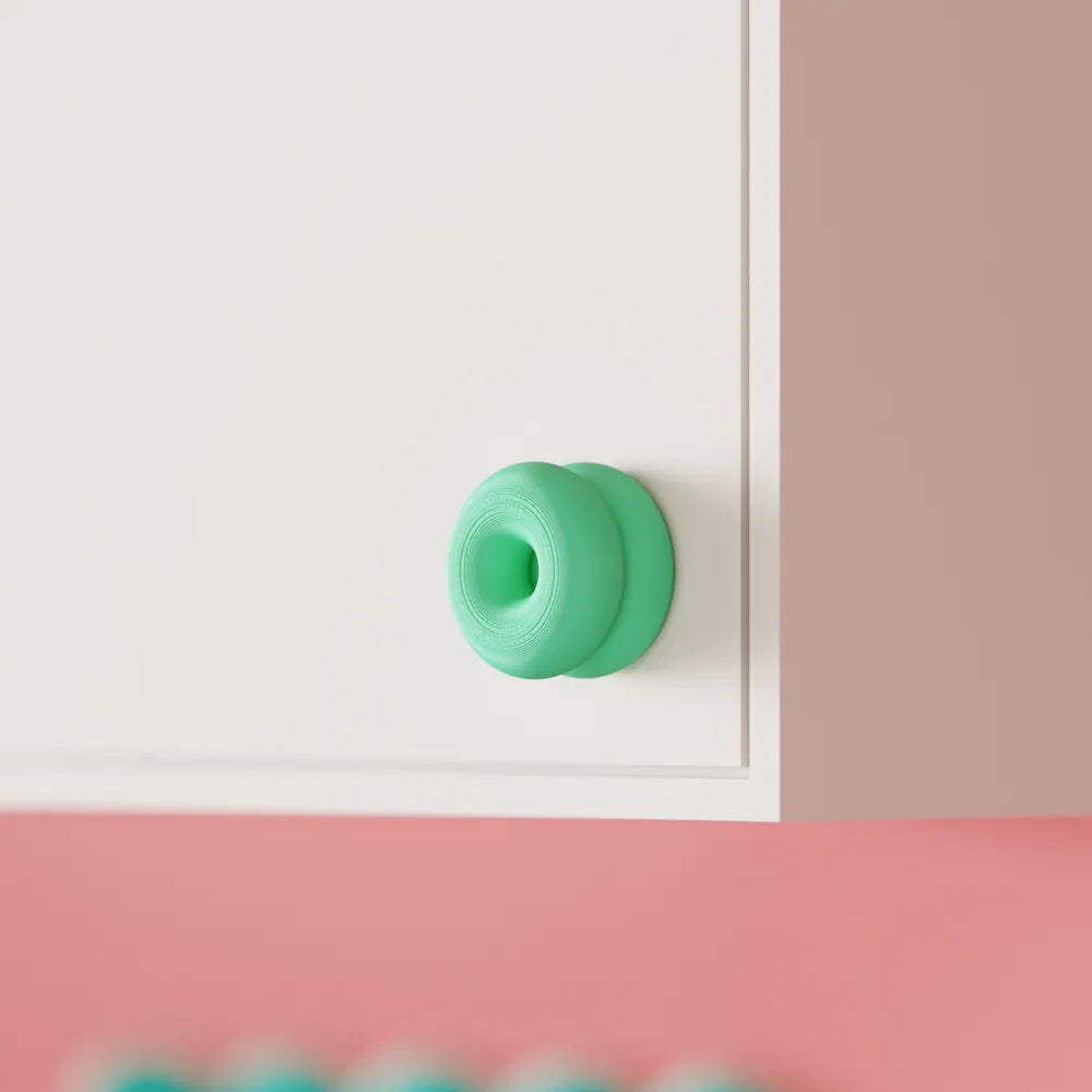 Double-donut cabinet handle angled view