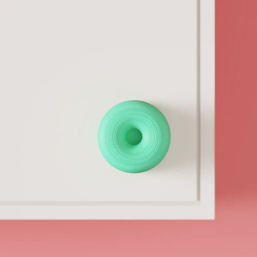 Double-donut cabinet handle side view