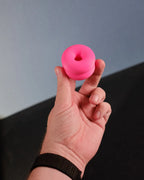 Double-donut cabinet handle in use