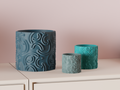 DuoForm arc-textured planter styled indoors