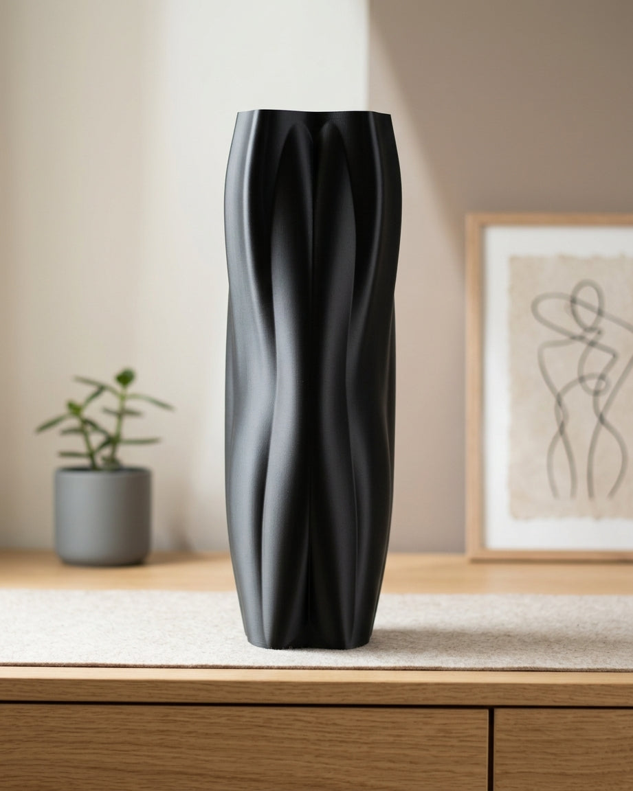 Flowganic decorative vase styled on a wooden sideboard in a modern interior.