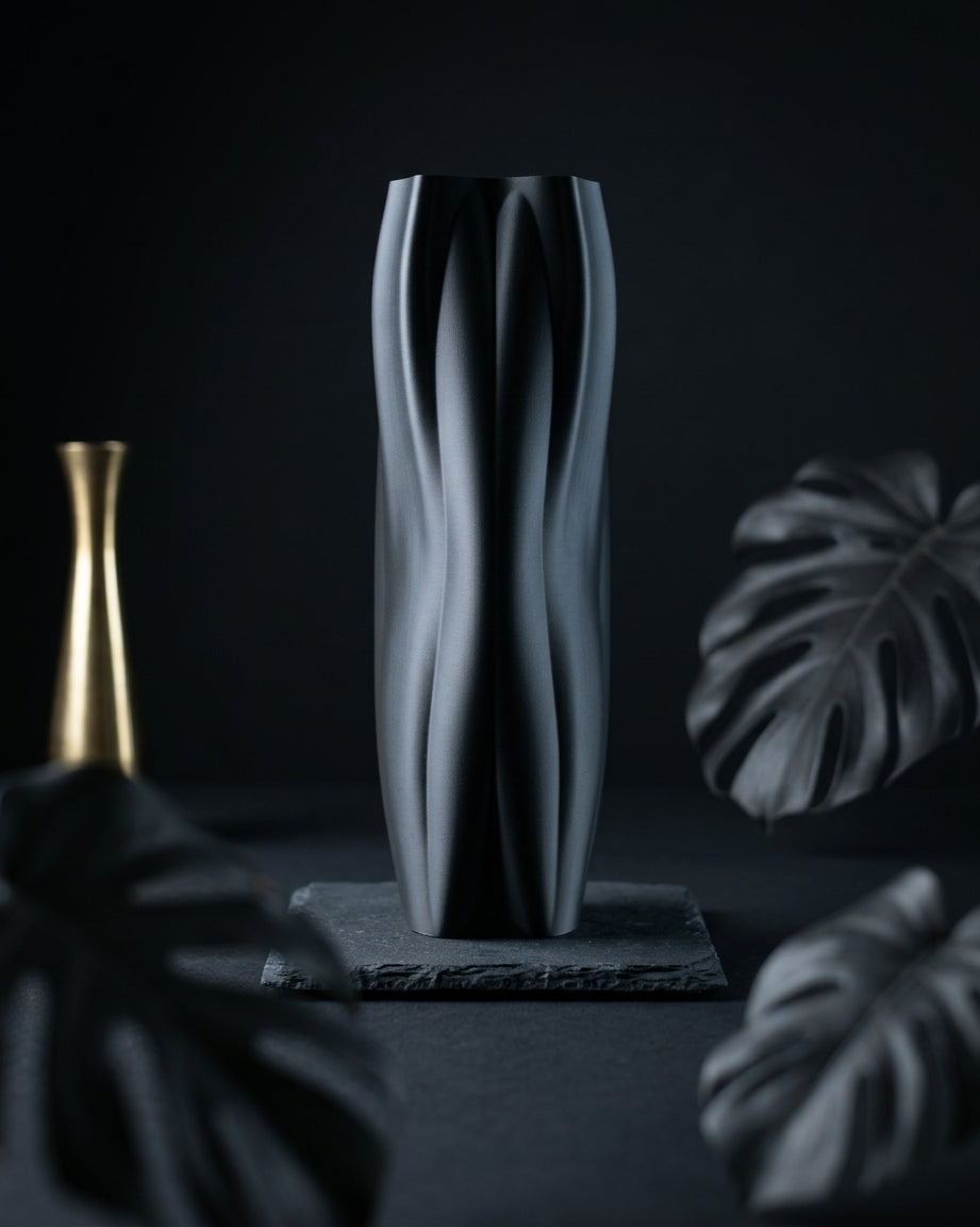 Flowganic vase displayed as a dark monochrome home decor accent.