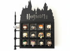 Display case with 'Hogwarts' text featuring various figurines on a white background