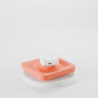 Catch-all tray detail highlighting its clean lines and device recess.