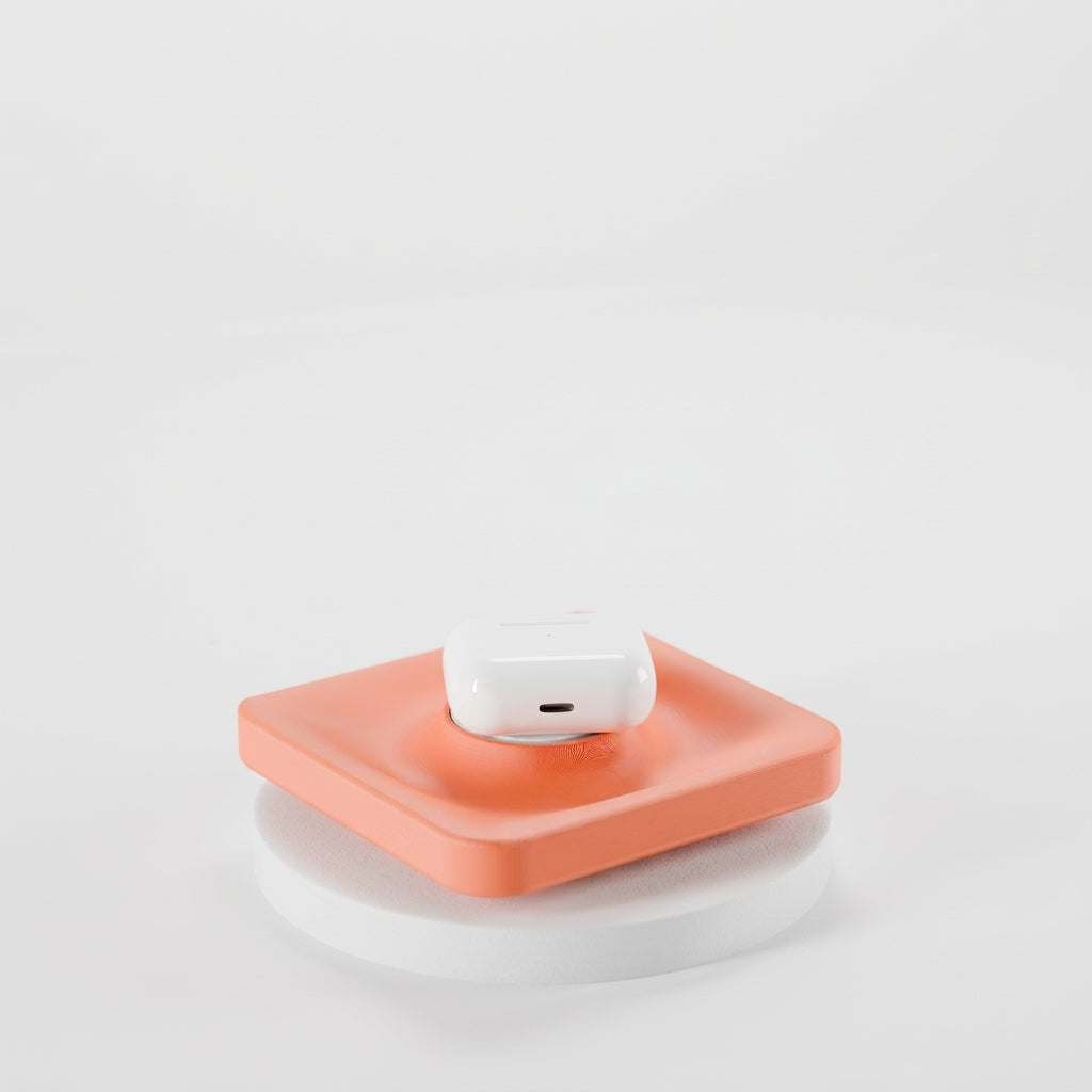 Catch-all tray detail highlighting its clean lines and device recess.