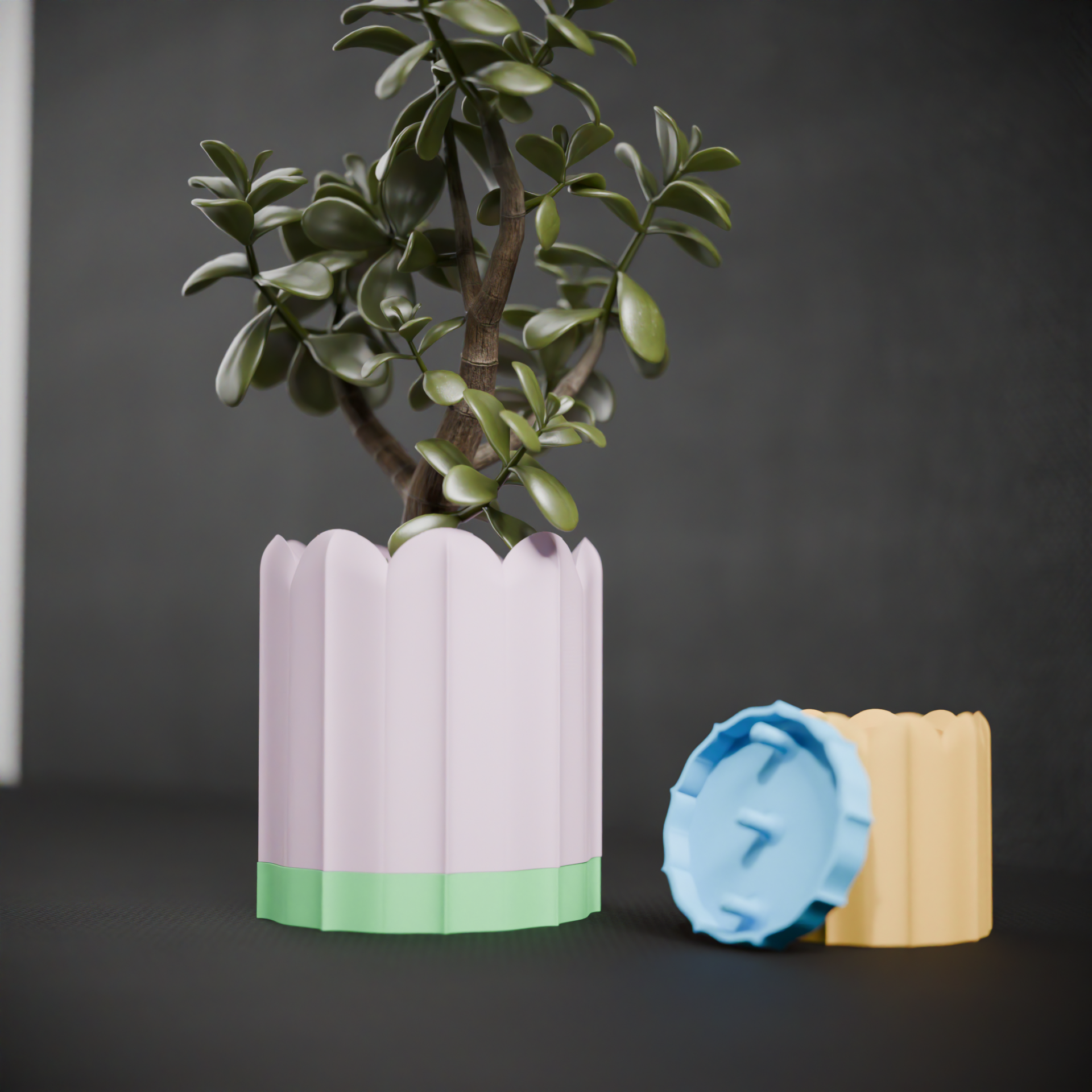 Ridged planter shown beside its removable blue and beige drip tray components