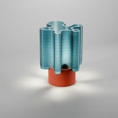 RippleWave E27 table lamp angled view showing its two-part ribbed design
