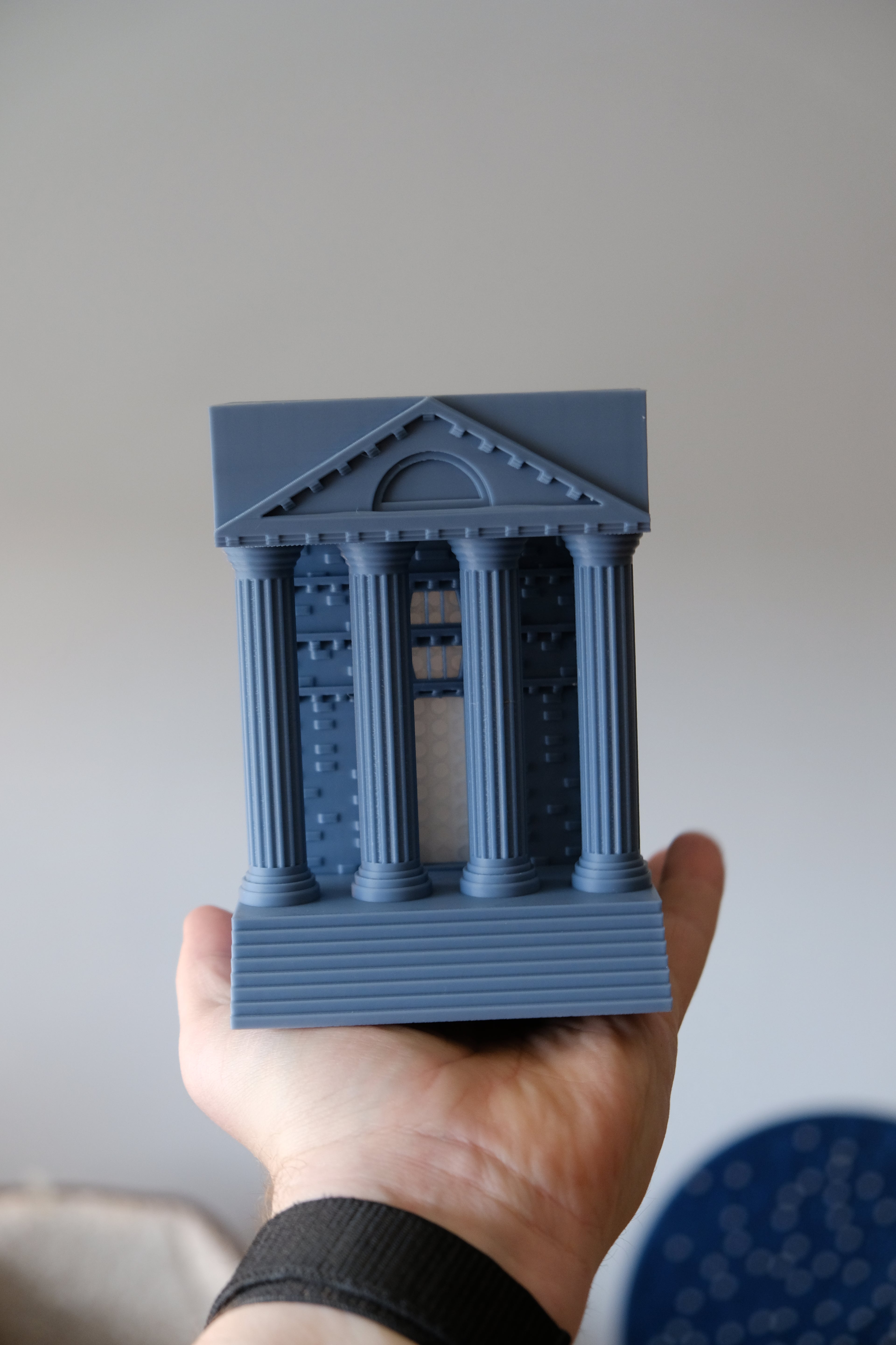 Roman temple book nook displayed on a bookshelf