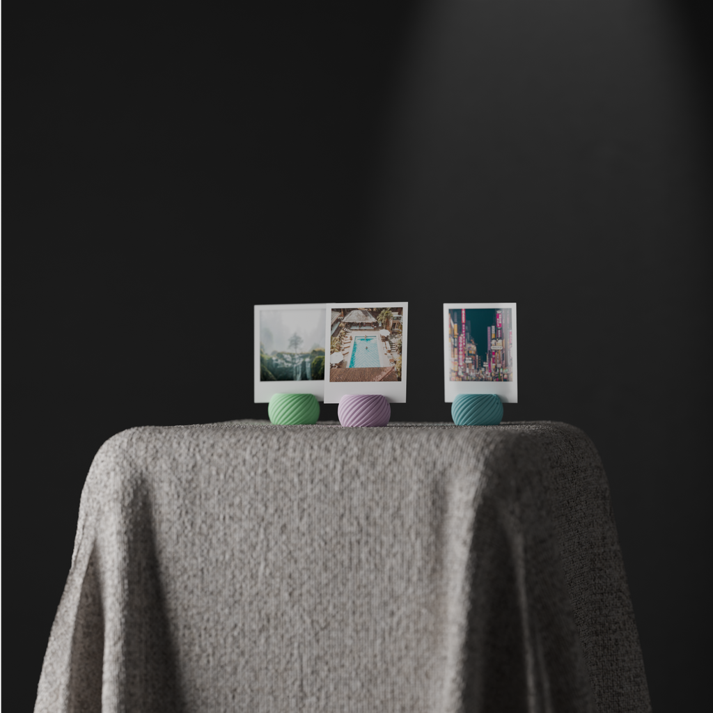 Front view of the sculptural spiral photo stand