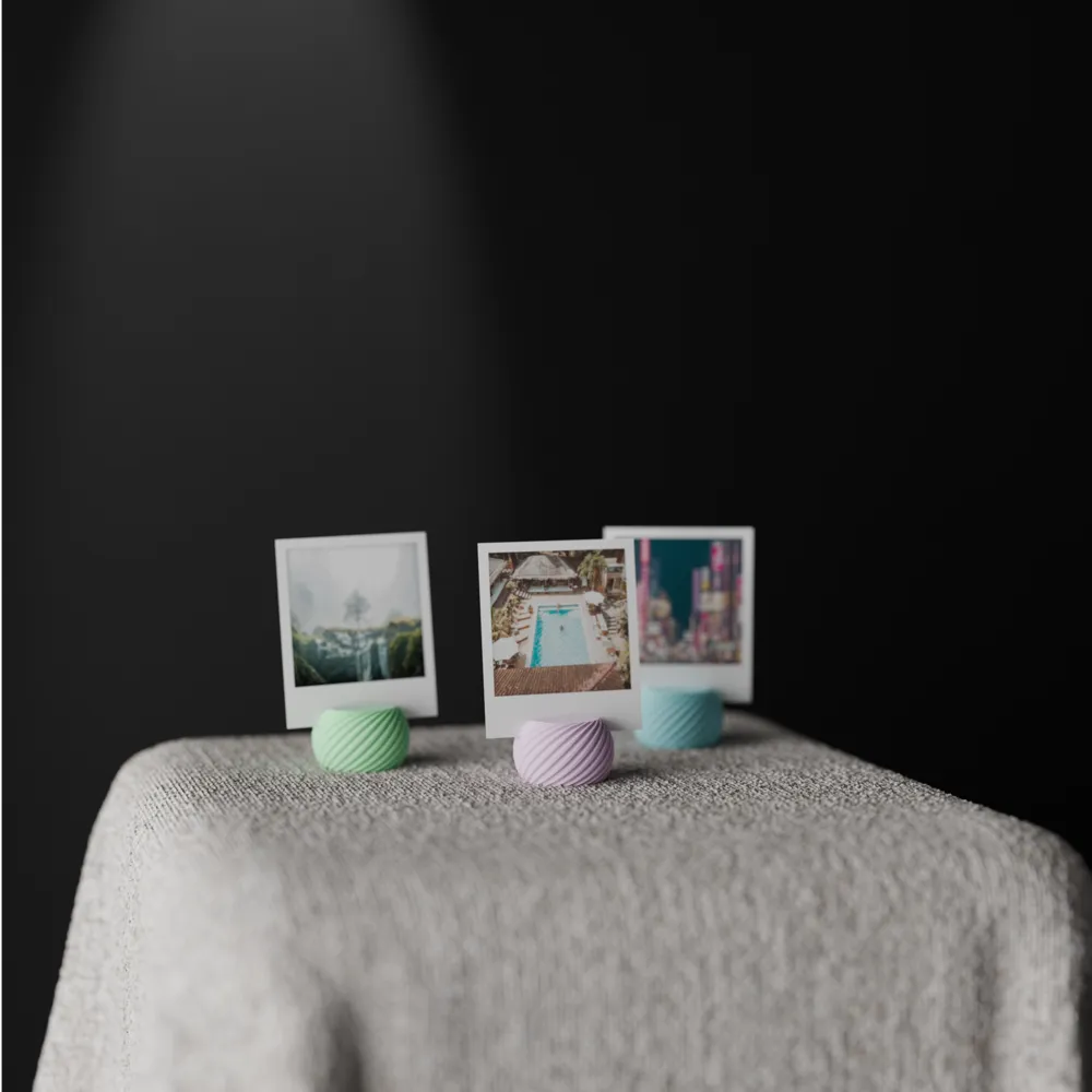 Spiral photo holder displaying an instant photo