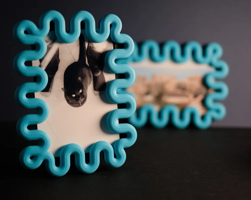 Wibble sculptural photo frame displaying a print