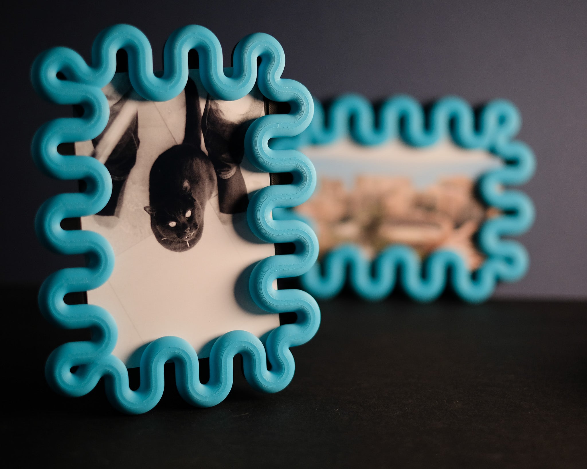 Close view of the flowing edge on the Wibble photo frame