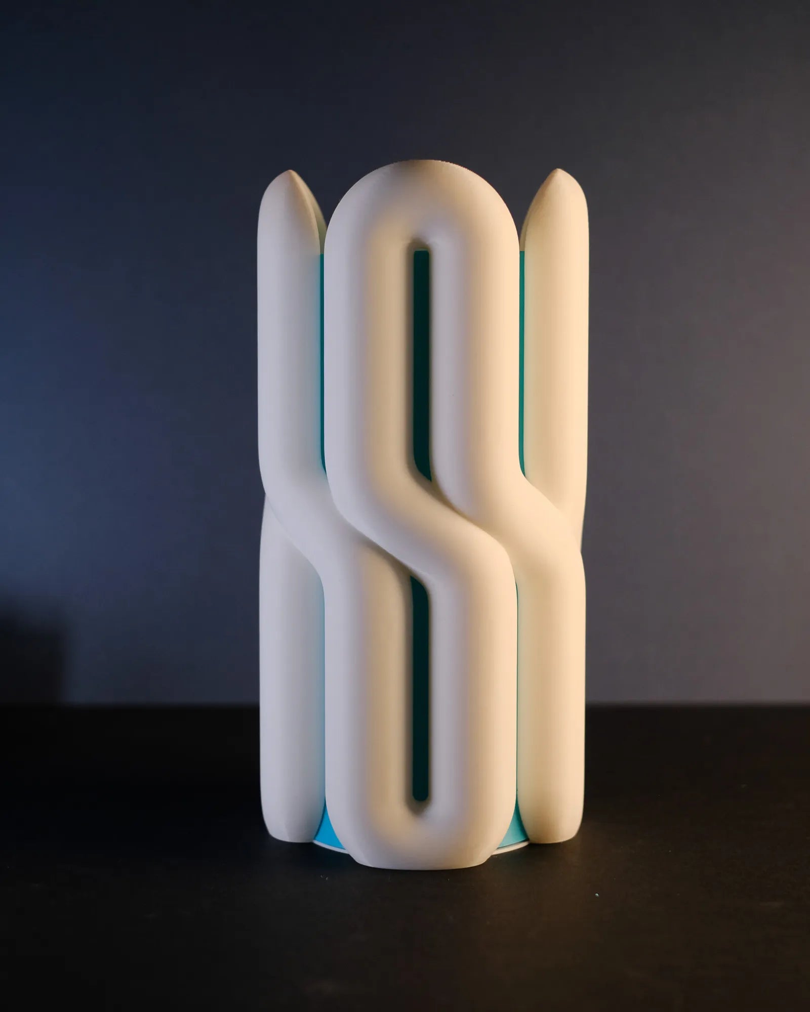 Front view of the two-part Wibble vase showing its rounded interlocking shape.