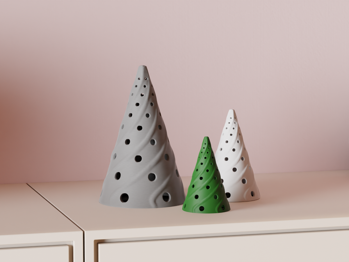 Wisp Christmas tree LED tealight shades arranged on a shelf