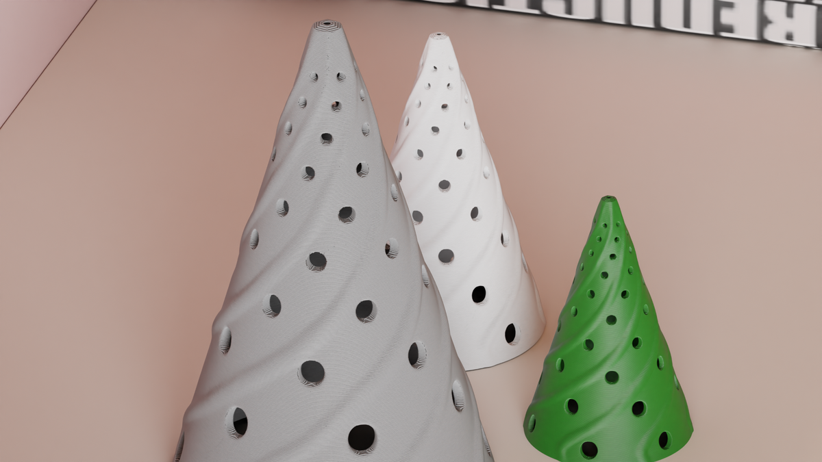 Wisp Christmas tree LED tealight shade showing patterned openings